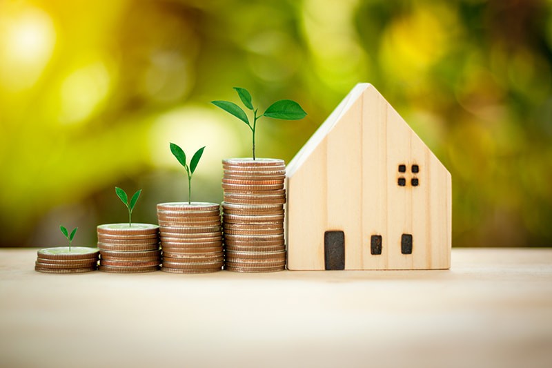 illustration pour montrer que si vous investissez correctement, vous pouvez acheter une maison.